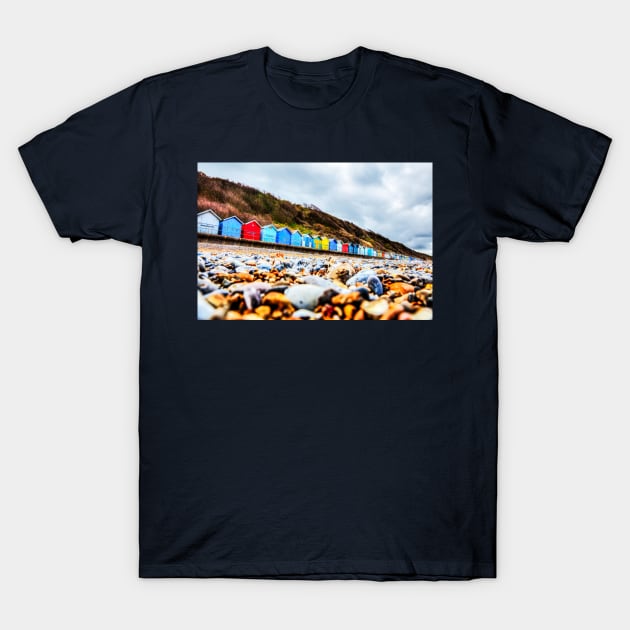 Cromer Beach Huts And Rocky Beach T-Shirt by tommysphotos